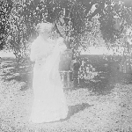 Cover image for Photograph - Negative - Woman in garden [holding a baby]