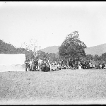 Cover image for Photograph - Glass negative - Parish picnic [Group in bush setting by tent]