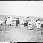 Cover image for Photograph - Glass negative - Parish picnic [group of children on beach beside Derwent River]