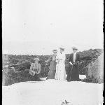 Cover image for Photograph - Glass negative - Mount Wellington [Four women in snow - three standing, one kneeling with camera]