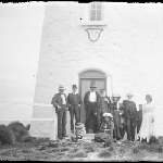 Cover image for Photograph - Glass negative - South Bruny Island lighthouse [group of men, women and children in front of lighthouse]