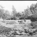 Cover image for Photograph - Glass negative - Farm [Man sitting on rocks in river ?]