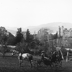 Cover image for Photograph -  View of Government House with horse and buggy in the foreground