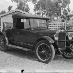 Cover image for Photograph - Vintage car with rumble seat; possibly Model T Ford; no number plate for identification