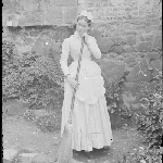 Cover image for Photograph - Unidentified woman 179-14 [colonial maids dress, holding broom]