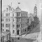 Cover image for Photograph - View of  Australian Mutual Provident Society Building corner Elizabeth and Collins Street and looking down Elizabeth Street to the GPO [glass plate]