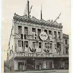 Cover image for Photograph - Charles Davis Store, Elizabeth Street decorated for the Queens Coronation