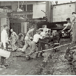 Cover image for Photograph - Hobart floods - Charles Davis store was flooded - photographs of the clean up operations