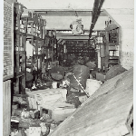 Cover image for Photograph - Hobart floods - Charles Davis store was flooded - photographs of the clean up operations