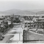 Cover image for Photograph - View of Hobart from telephone exchange building, down Davey Street- shows St David's Park and city around wharf areas
