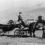 Cover image for Photograph - Side view of landau (Alf Hope, driver), Hobart with Mt. Wellington partial view in background,