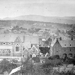 Cover image for Photograph - A rear view of St. Mary's Cathedral, with Glebe, Werrella at North Hobart and the Congregational Memorial Church in the distance
