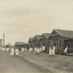 Cover image for Photograph - Cadbury's factory, chocolate manufacturers, Claremont, near Hobart - workers leaving the factory