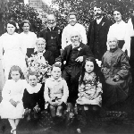 Cover image for Photograph - Back row 6th from left: Frank & Bridget Brewer & Dorothy Weeding; seated: Robina & William Henry Brewer & Mrs Brewer's sister; front row 2nd from left: Charles, Eric & Thea Brewer