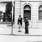 Cover image for Photograph - Hobart - Murray Street, showing section of Toplis' Chemist shop and YMCA