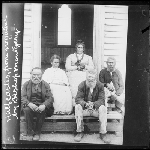 Cover image for Photograph - Group seated on church steps, [Henry Beeton; Phil Thomas; Jane Beeton; Nancy Mansell; and Jack Maynard] / Photographer Bishop H H Montgomery, 1892