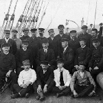 Cover image for Photograph - Amundsen and party on deck of vessel in Hobart - see Tas Mail 14 Mar 1912  p20