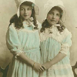 Cover image for Photograph - Hand-tinted photograph of Kathleen Mary  (b.1902) and Marjorie Alice (b.1903) Foley, daughters of W J & B.A. Foley, Launceston.  M.A. Foley married J.R. Sullivan & died 14/9/1975  (TAMIOT)