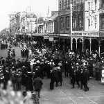 Cover image for Photograph - Hobart-Elizabeth Street-view from corner of Liverpool Street looking towards Collins Street-shows crowds all over the street.