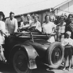 Cover image for Photograph - Mills and Garth families, Cygnet-beside automobile.
