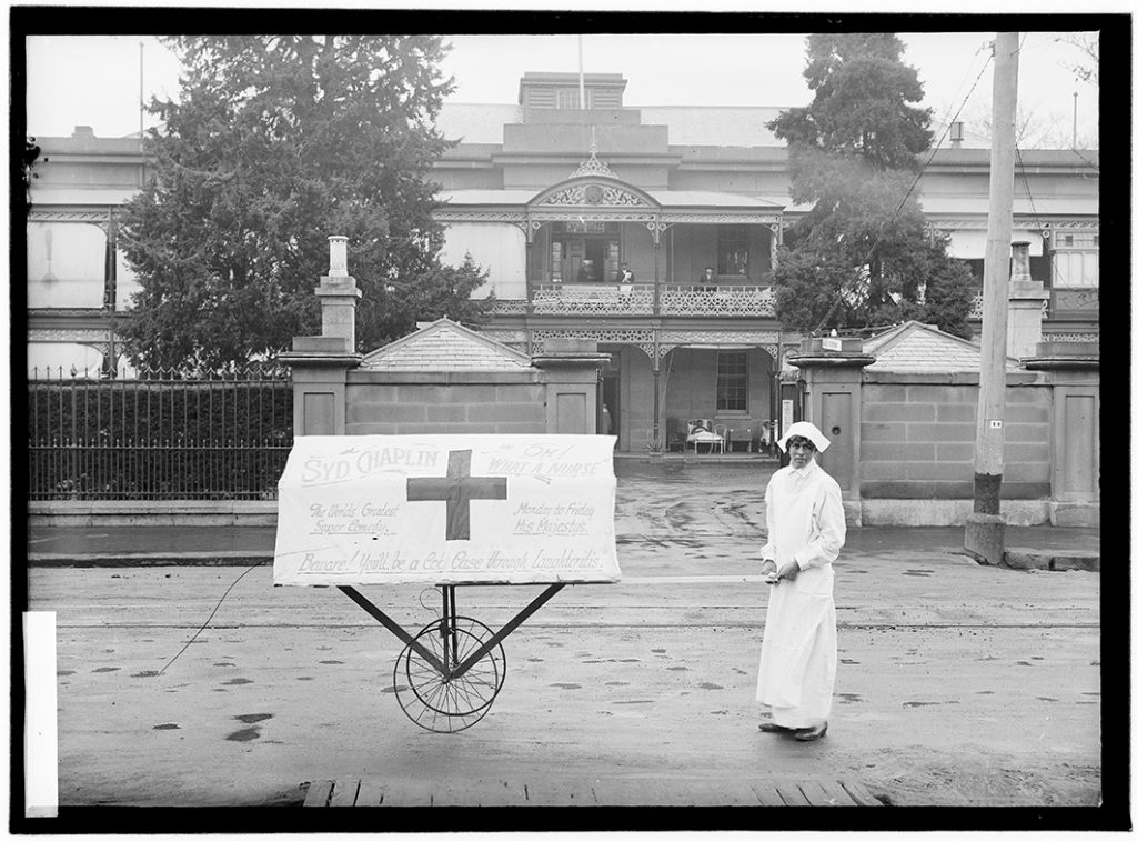 Photograph - General Hospital Hobart, entrance Liverpool Street [advertising sign for movie "Oh What a Nurse' - Aug 1927] [glass plate]
