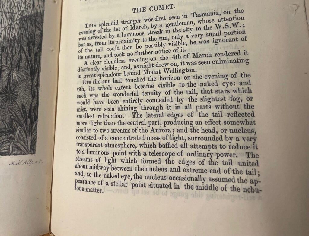 close up picture of the page of a book containing an article title The Comet