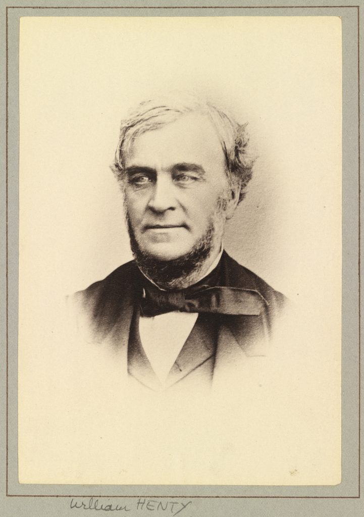 A black and white photo of a man.