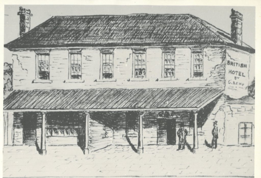 A sketch of a 2-story hotel, as seen from the front. Text on the side of the building reads: "British hotel by G. Kemp.