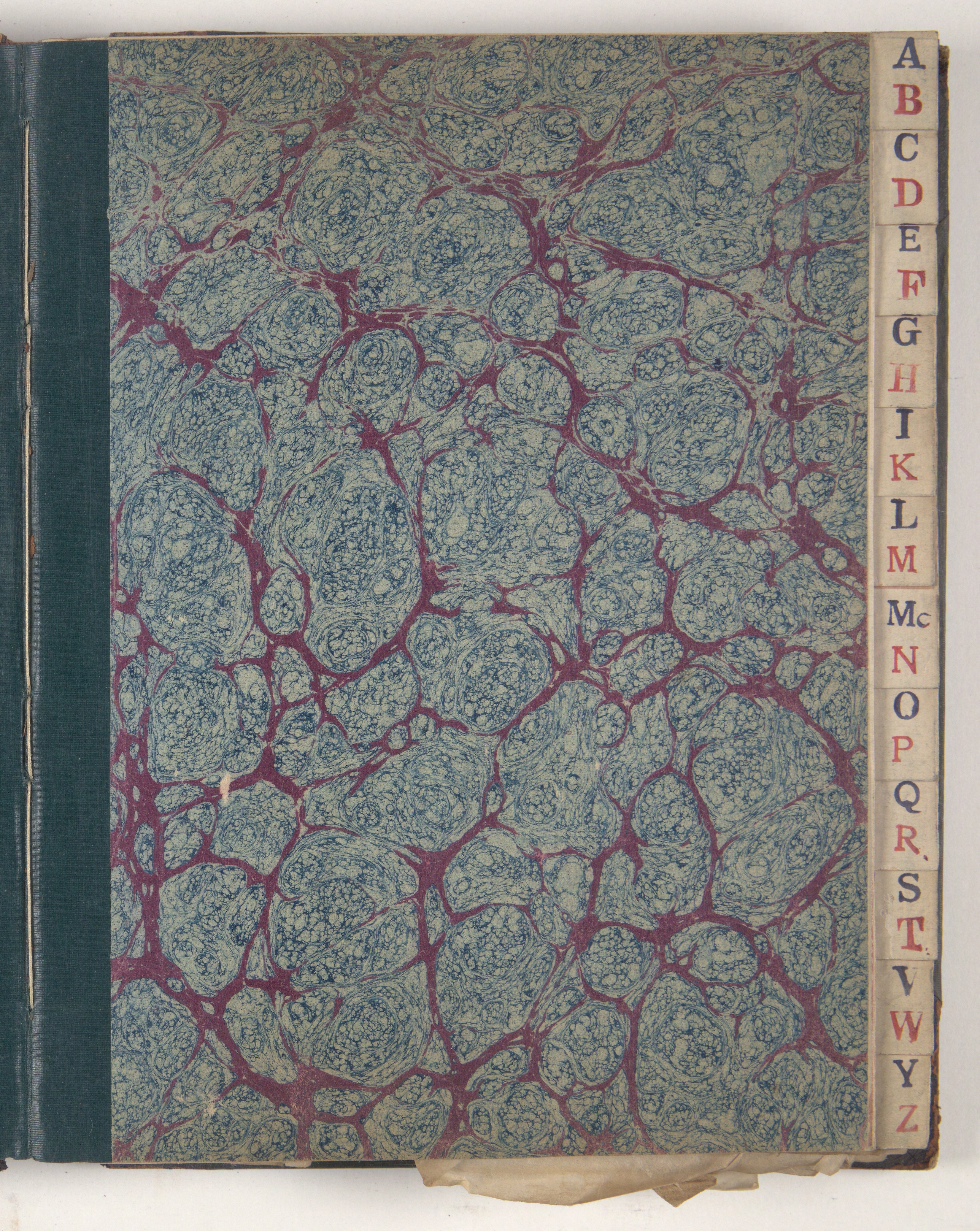 The cover of a letterbook. it is decorated with blue and purple swirls. There are boko tabs on the right with alphabetised letters A through to Z.