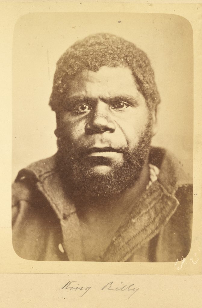 A black and white photo of an aboriginal man.