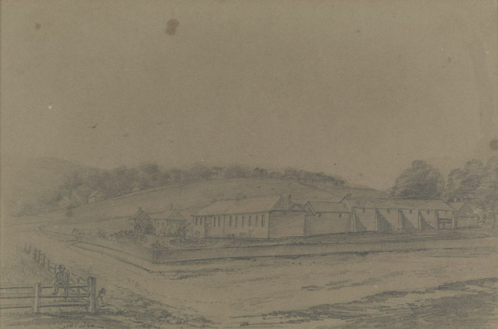 An old drawing of houses at the corner of a road.