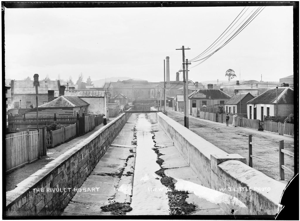 A black and white picture of a rivulet in Hobart