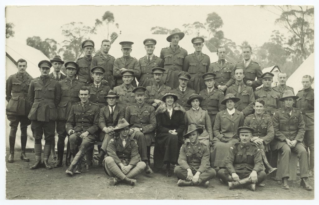 A black and white photo of an army battalion posing for a photo.