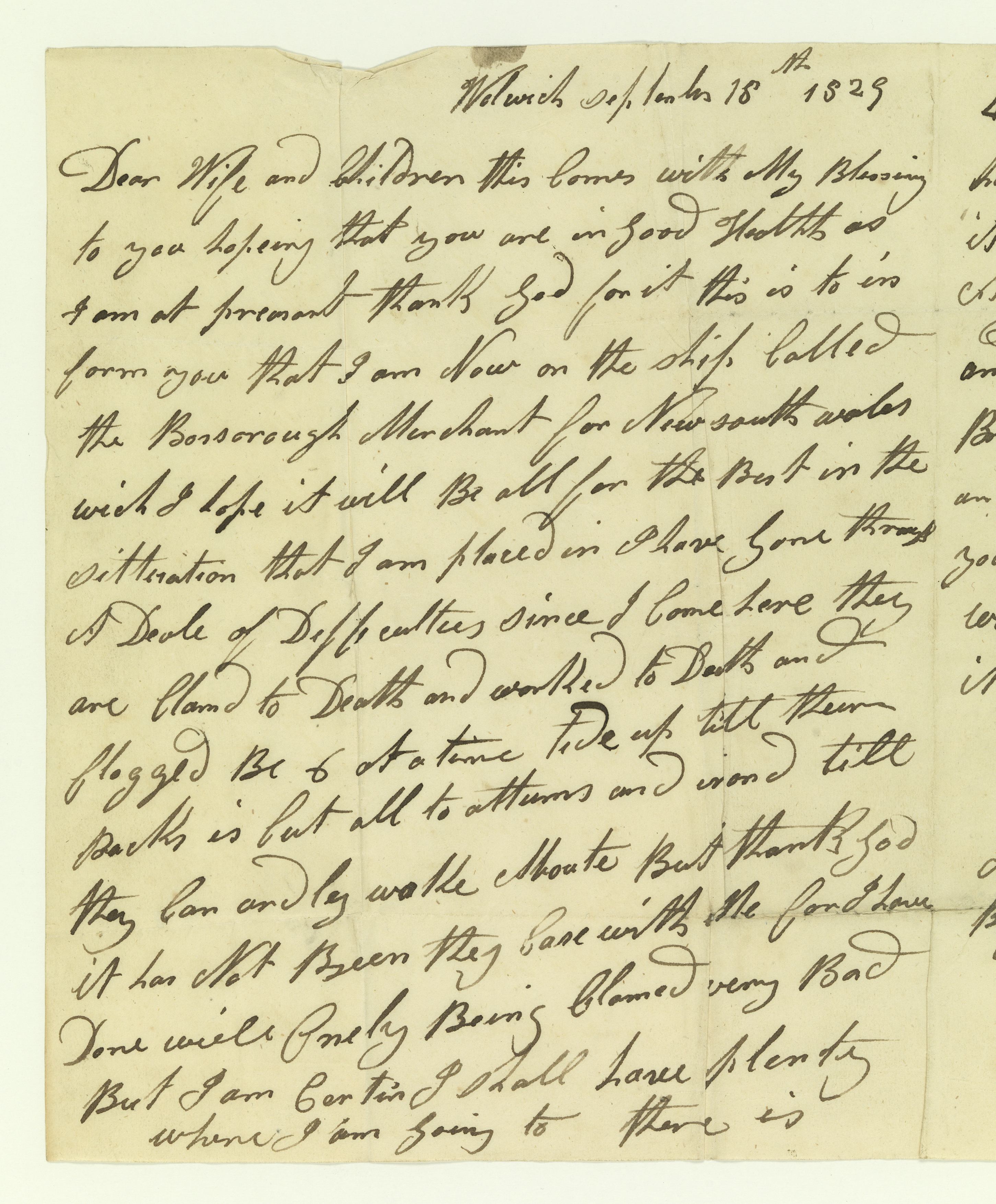 An old piece of paper with cursive text on it. Text illegible.