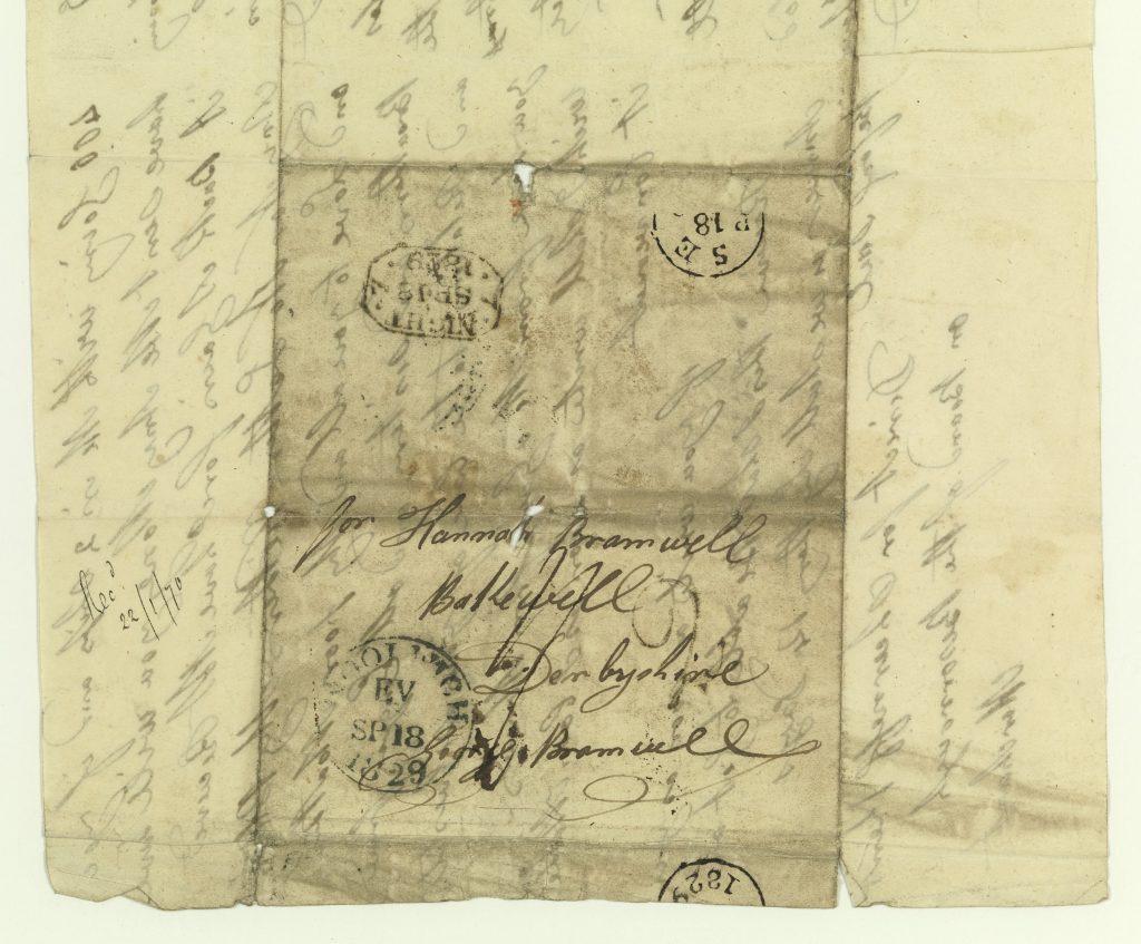 An old piece of paper with cursive text on it. Text illegible.