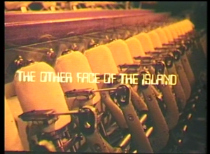 a still taken from Film – The Other Face Of The Island. Textiles machinery